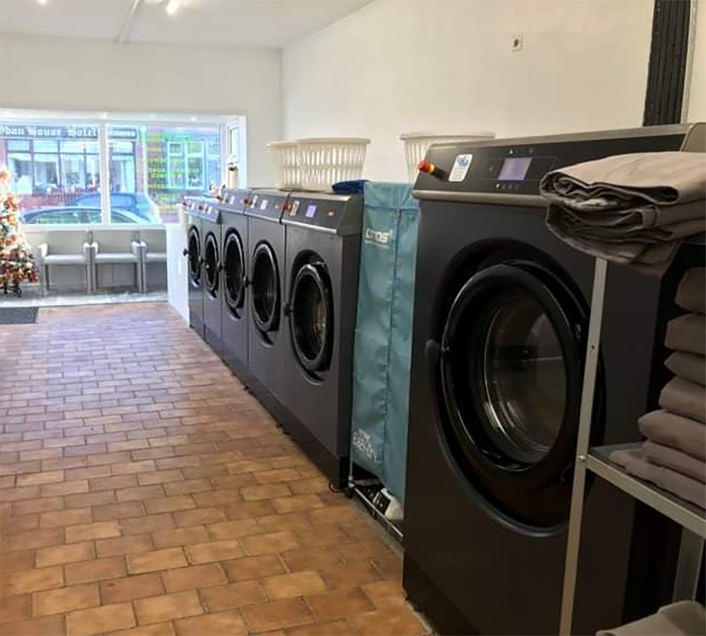High quality washing machines in the Impressed Launderette Blackpool offering washing, dry cleaning and ironing services to Blackpool and the surrounding area for clothes, bedding, duvets, sports kit, school uniforms, work uniforms, medical uniforms and more.
