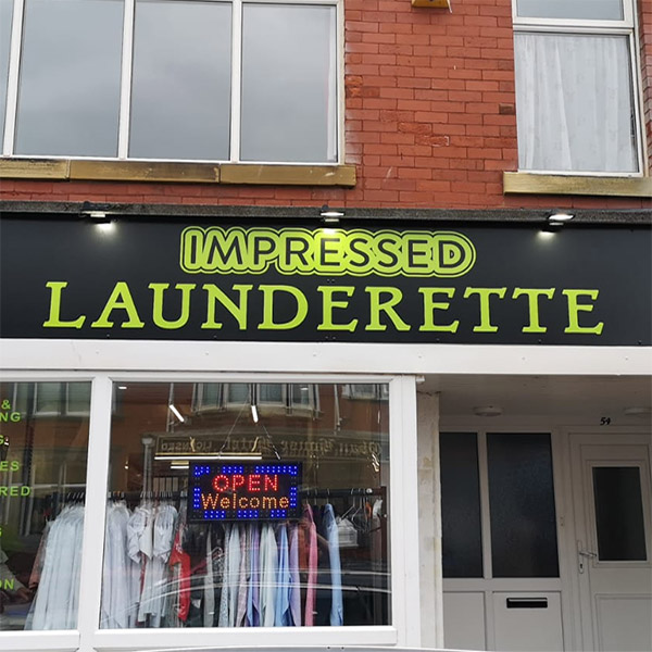 Impressed Launderette shop front Blackpool offering services for both domestic and comercial customers such as hotels, guest houses, nursing homes, restaurants and sports teams.